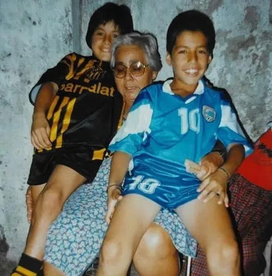 Luis Suarez and friend with his Grand Mum. Credits:  The Sun.