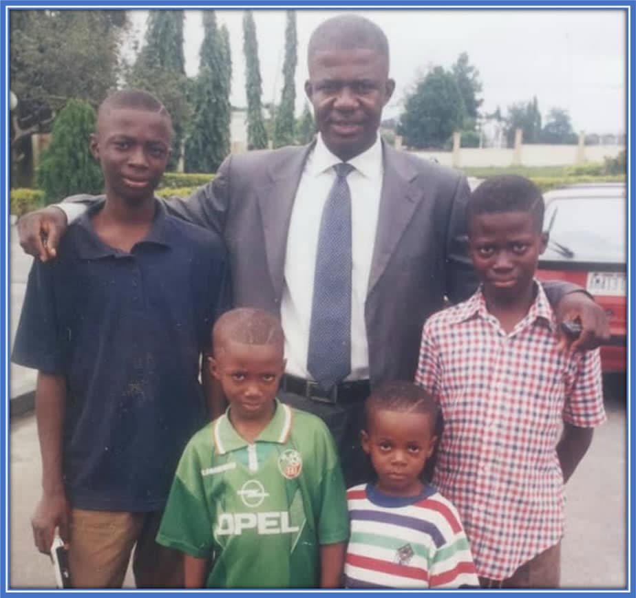 This is Mr Leo Moffi and his children (four boys). Little Terem is pictured at the front (left side). Image Credit: ScoreNigeria.