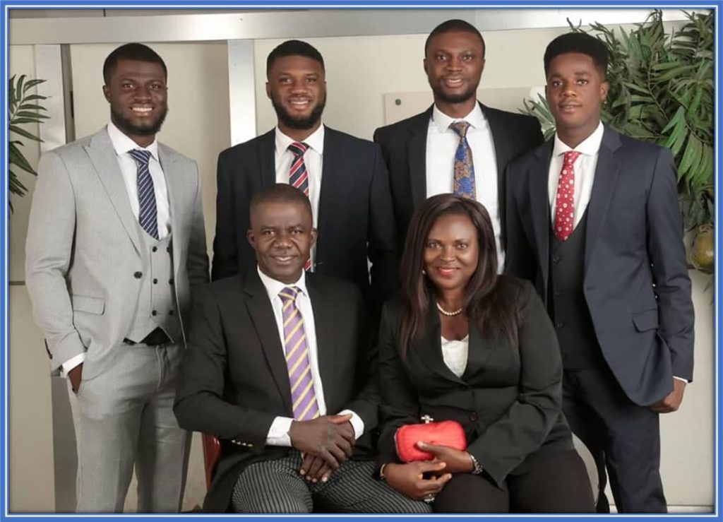 Introducing the Moffi family: Terem Moffi's father, Leo, mother, Margaret, and his brothers. Can you spot Terem among his siblings? A hint for you: the athlete stands second from the left. Image Credit: ScoreNigeria.