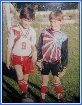 He (right) began training in football at a young age with his brother.