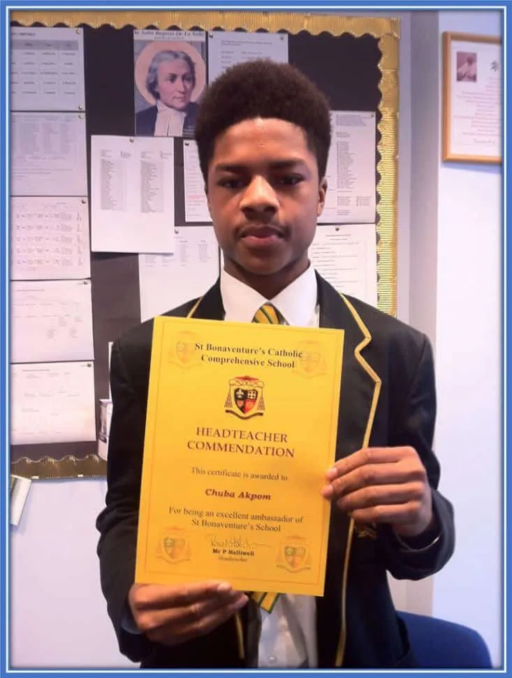 Chuba Akpom put his certificate on display.