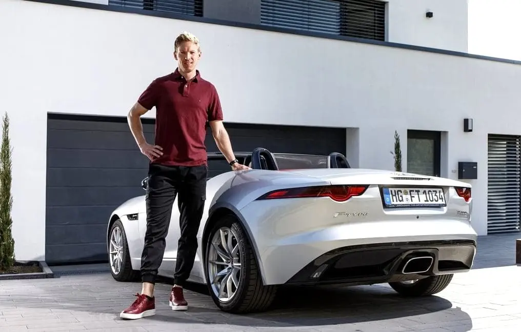 The young German coach is a big fan of the Jaguar - his choice of car.