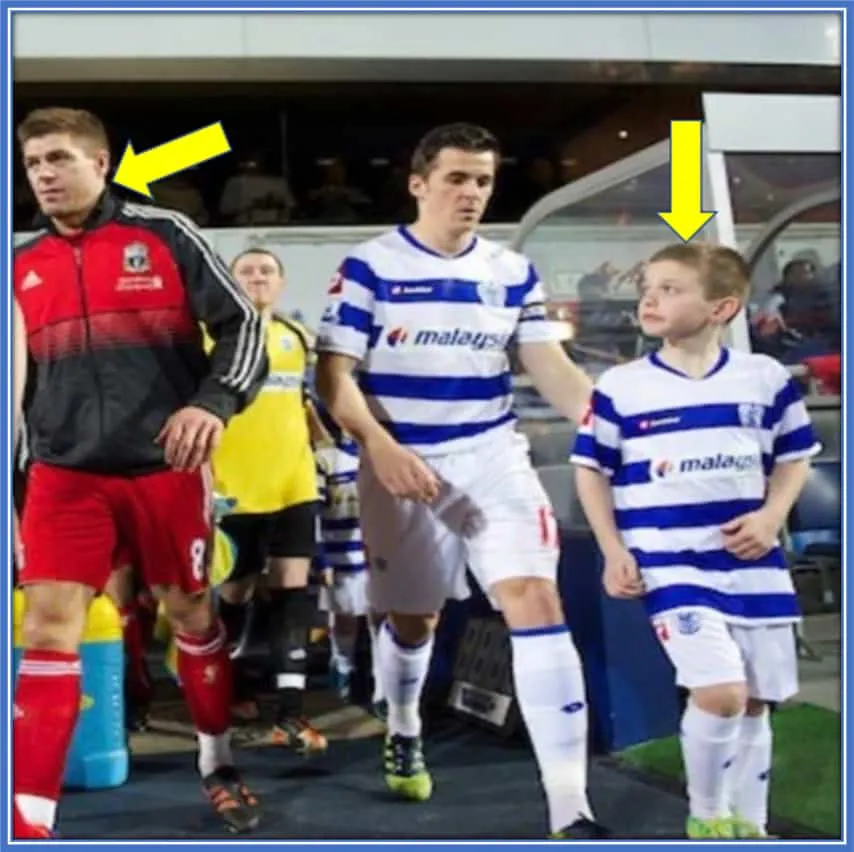 It was March 2012 when Harvey Elliott (a mascot for QPR) met his Childhood Hero (Steven Gerrard).