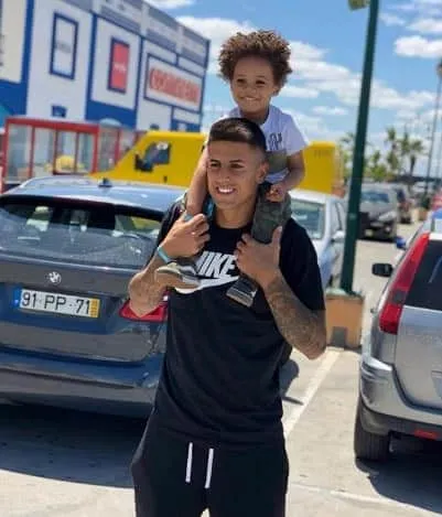 A happy Cancelo bonds with his son.