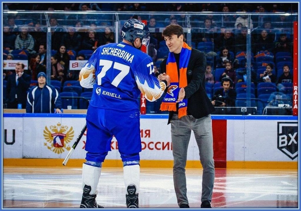 Aside from football, he enjoys watching hockey. You can hardly imagine what fans would felt as they watched two celeb shake each other in the arena.