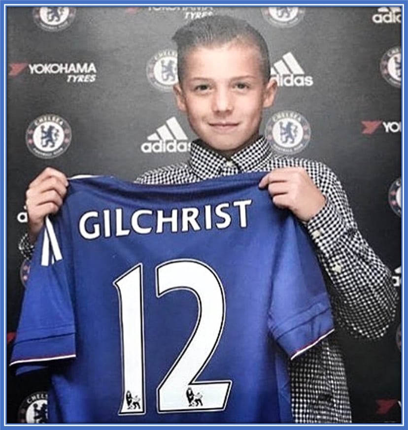 11-year-old Alfie Gilchrist proudly clutches the number 12 Chelsea shirt as he rejoins the club for a second stint. Credit: IG/alfie.gilchrist.