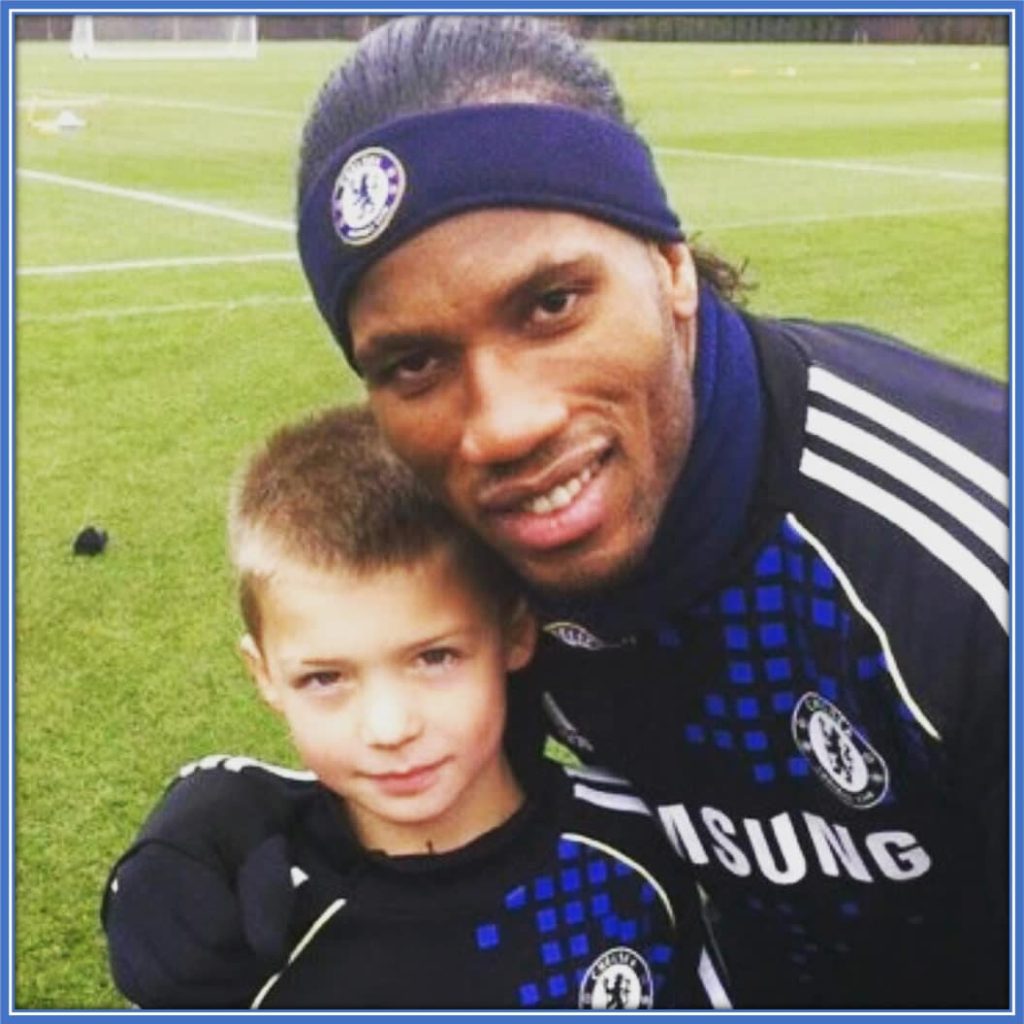 A Cherished Encounter: Young Alfie Gilchrist's Memorable Day Meeting Didier Drogba - Drawing Inspiration from the Legendary Striker's Words and Triumphs. Credit: Instagram/alfie.gilchrist.