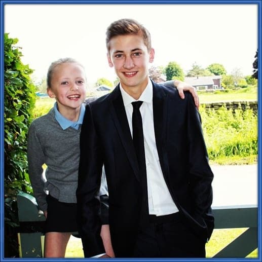 Nat Phillips's pre-prom photo is taken alongside his little sister, Saskia Rose Phillips. This shows he did went to school.