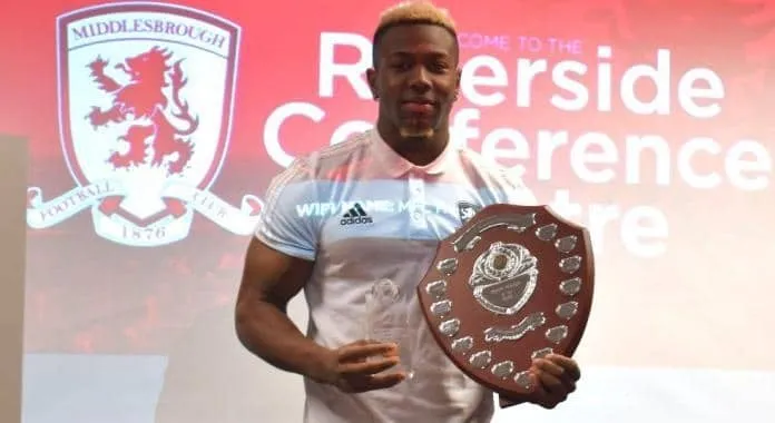 Adama Traore is pictured here posing with one of his Middlesbrough Awards.