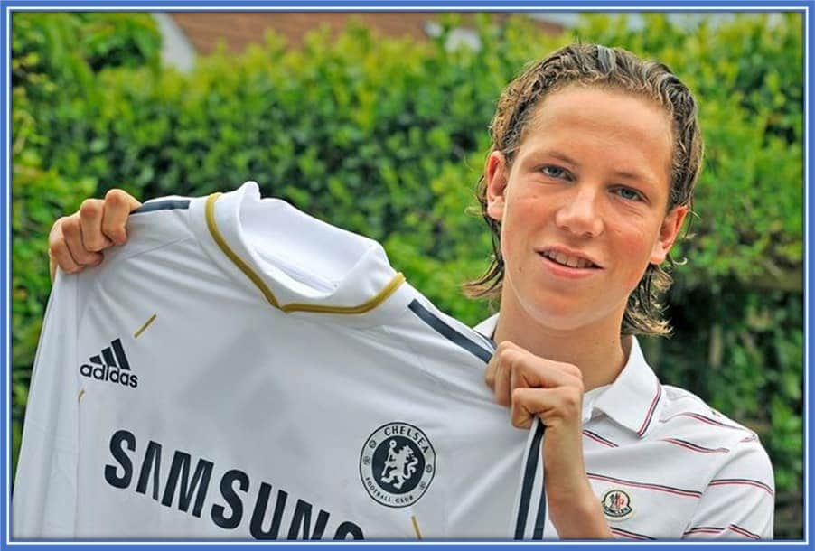 This is Steven Berghuis' Brother, Tristan, as he holding a Chelsea FC jersey. He once had trials with the London club.