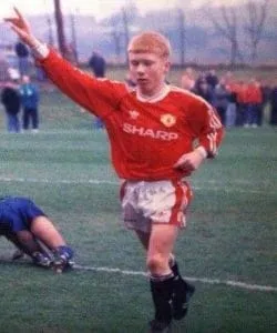 Paul Scholes Early Years in Career Football. He overcame early health challenges to pursue his passion for football. Starting at St Mary's RC Primary and playing for Langley Furrows, his talent caught Manchester United's attention.