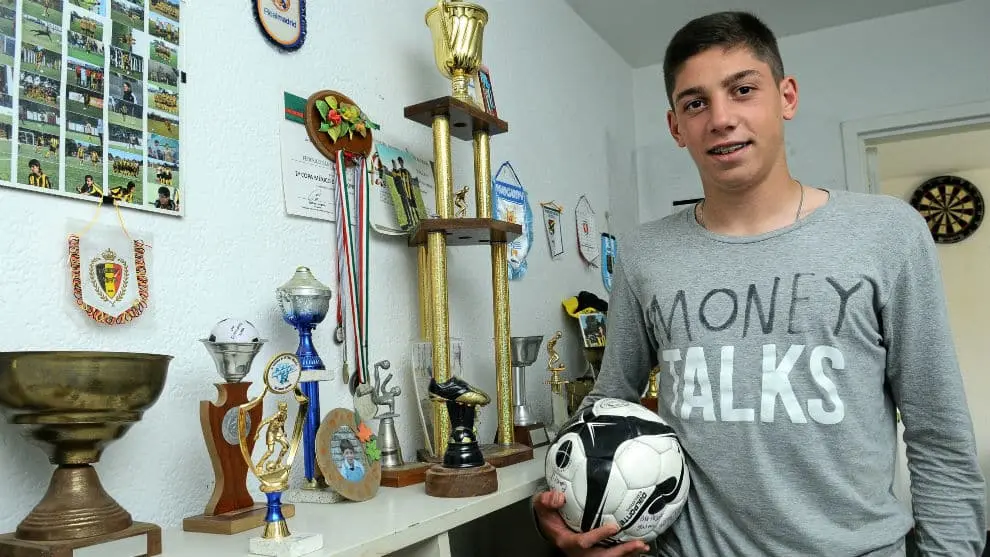 Federico Valverde pictured alongside his individual and club honours archived in his family home.