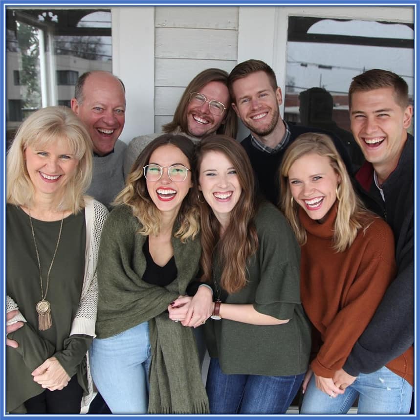 Becky and David look very excited about this photograph with their sons (Walker, Dawson, and Carter) and Daughter in-laws.