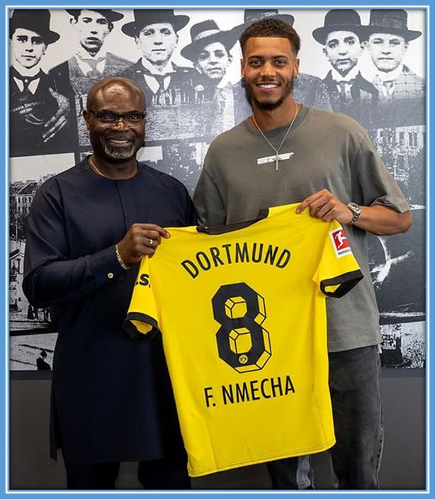 Felix Nmecha and his father Kalu Nmecha strike a pose as a testament to the signed deal with Borussia Dortmund. Image: Instagram/Felix_Nmecha.