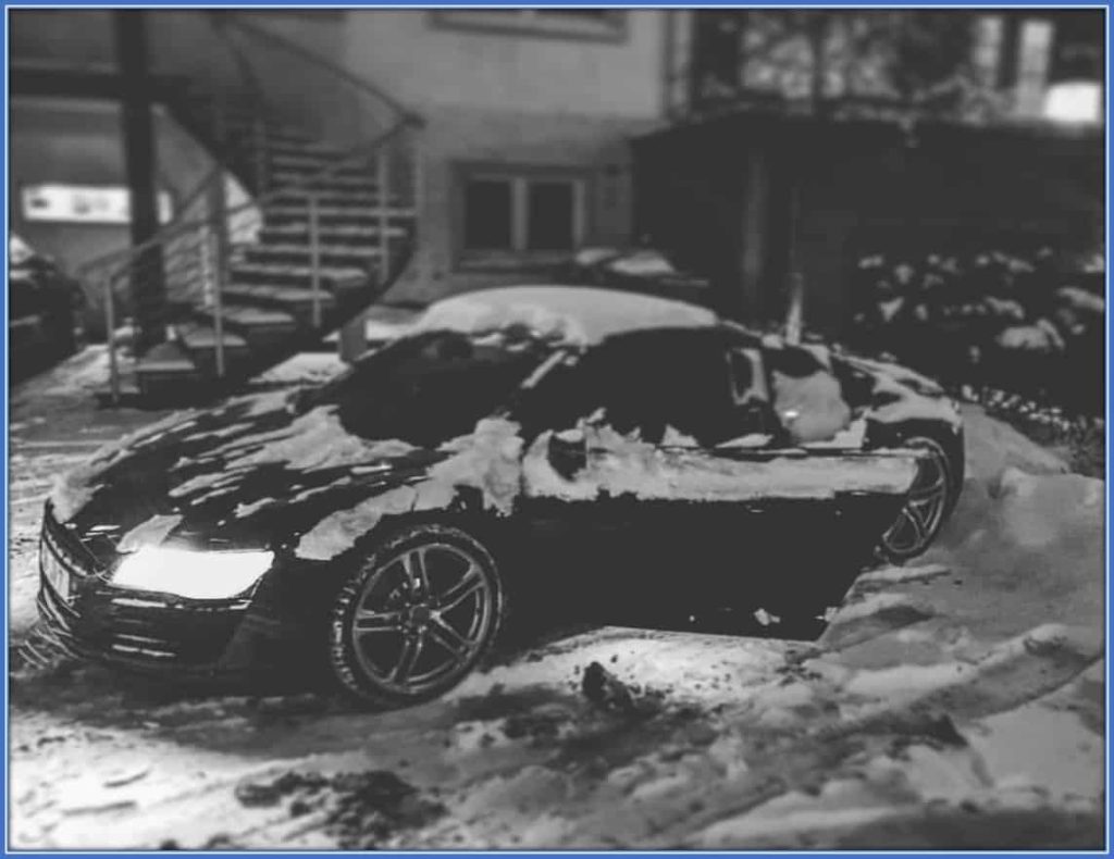 Behold the football genius car covered in snow.