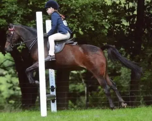 Alicia excels in netball with her agility and versatility on the court. Besides, she's an enthusiastic rider with her beloved pony, Boston.