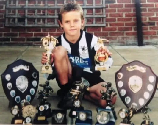 Here is Cantwell with the many trophies he won at Dereham Town Youth Systems.