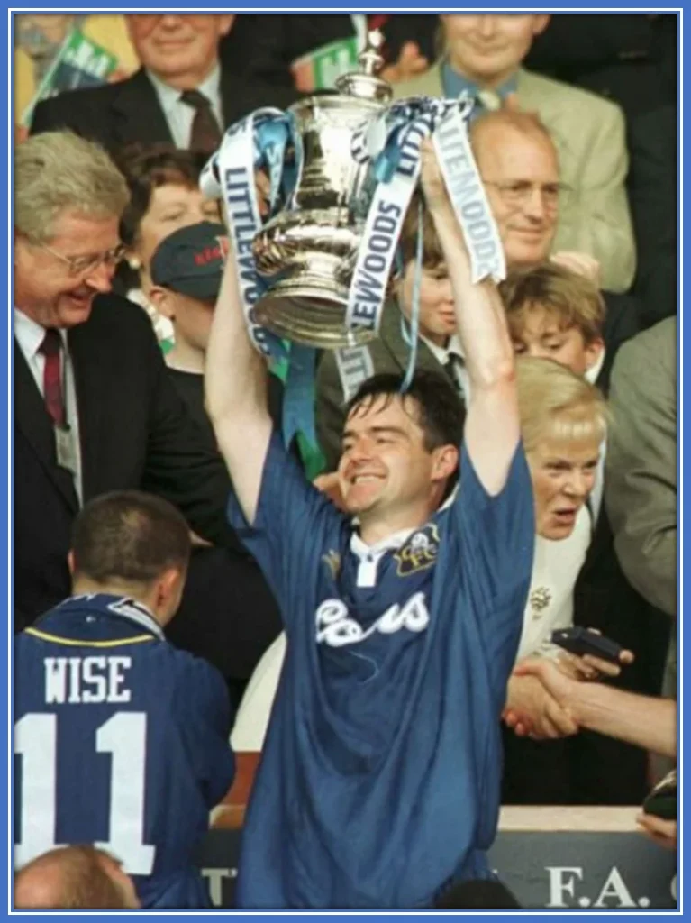 The Chelsea Legend turned Scottish Manager exudes jubilation as he revels in the glory of Chelsea's Cup victory, a moment etched in time during his illustrious playing career.