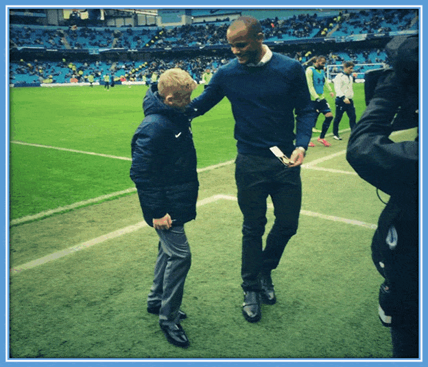 Tommy and Vincent Kompany talking at the Etihad Stadium. Picture: Twitter/Tommy_doyle8.