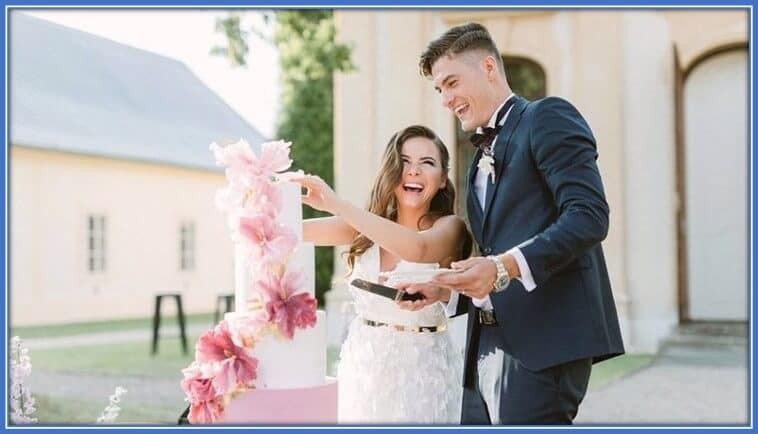 Of course, he is happy to have met his wife, Hana Behounkova. See how they laugh so gorgeously during their wedding.