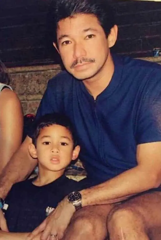 Young Faiq Bolkiah with one of his parents.