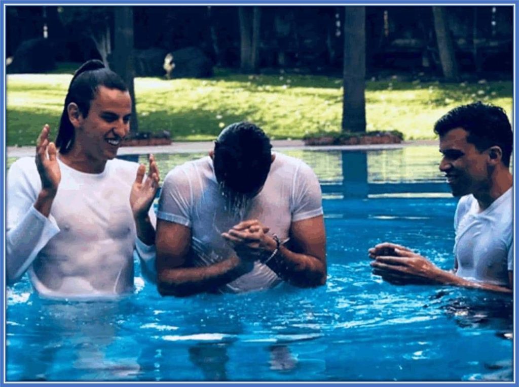 A photo of Santiago's water baptism as a Christian.
