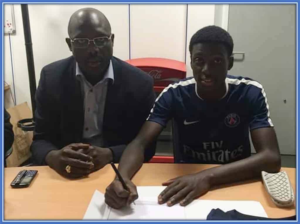 Weah was there for his son during the signing of his PSG contract.