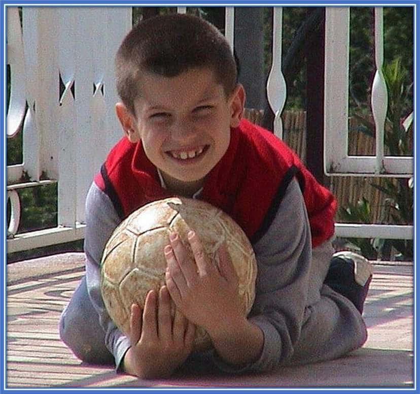 A very excited Dominik Livakovic practising goalkeeping in front of his family home.