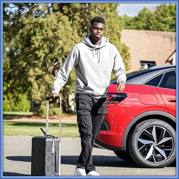 The Frenchman appears to own the Volkswagen car pictured right behind him.