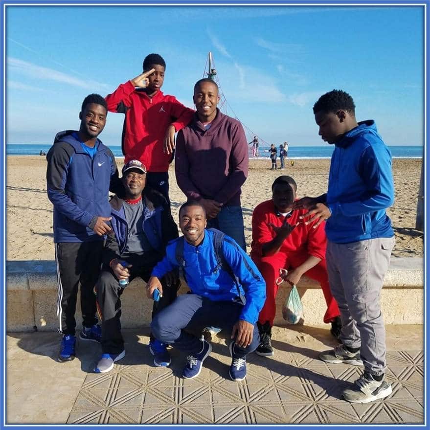 A photo of Shaq Moore's Brothers alongside their Dad, Wendell.