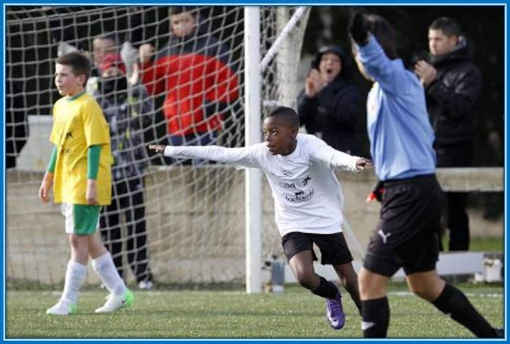 Young Nico Williams is pictured celebrating a goal at the 2012-13 Interscholastic tournament.