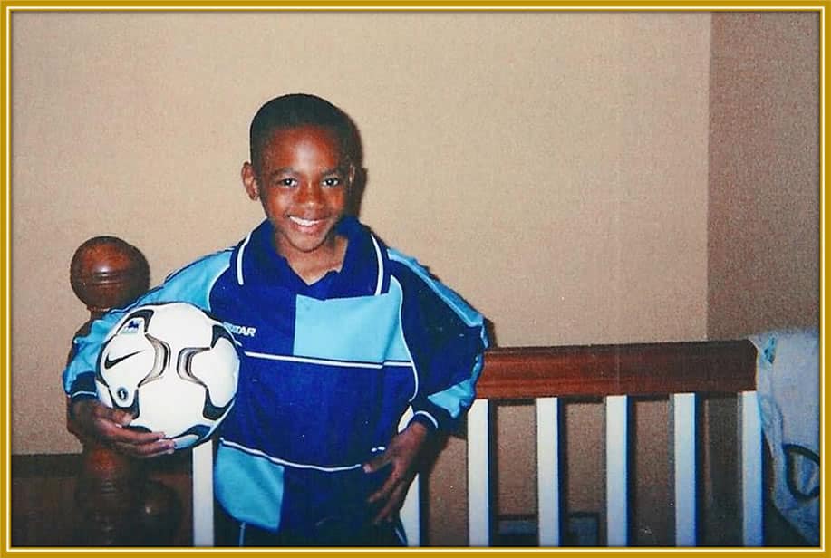 A Rare photo of Tosin Adarabioyo's childhood as he prepares to engage on another football battle.