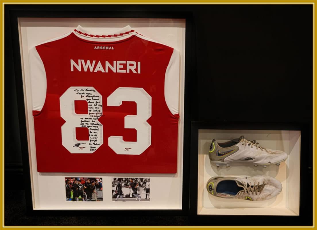 The donated boots and shirt Nwaneri gave to his alma mater.