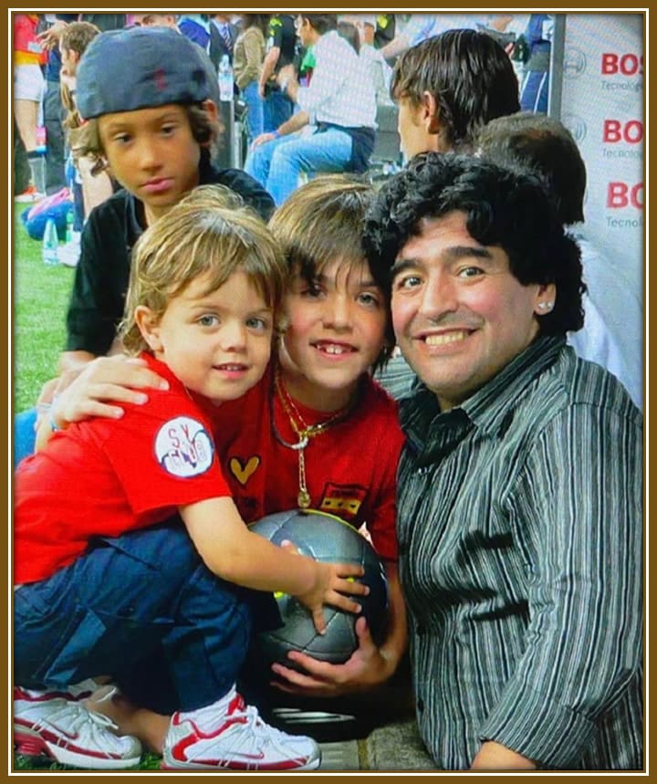 Daniel and Christian Maldini, beaming with joy after meet Diego Maradona after one of their father's games. 