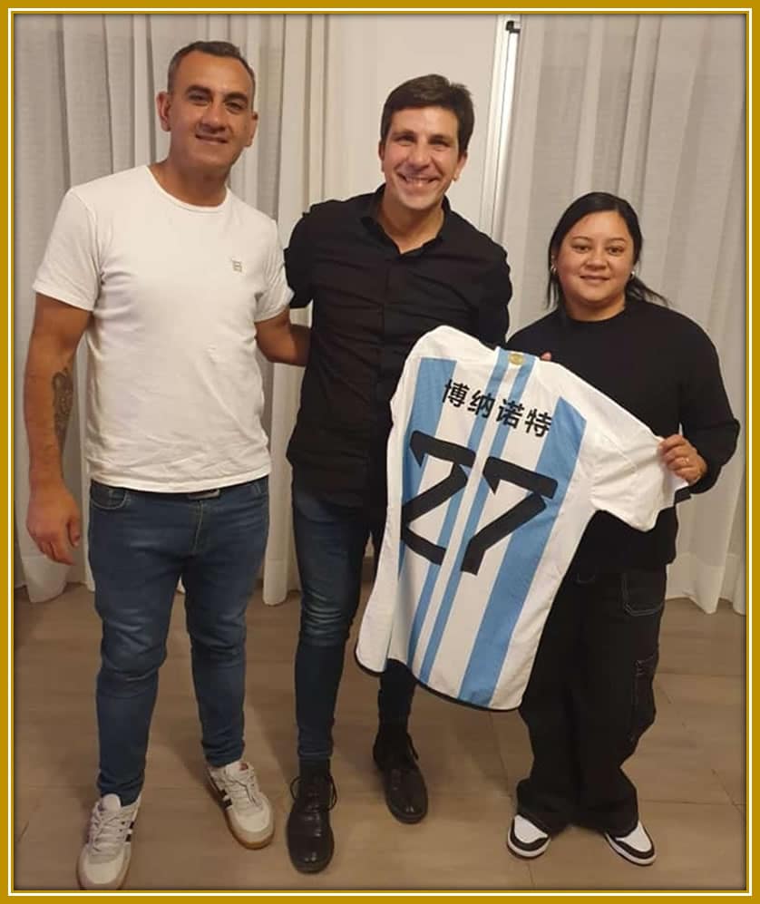 A proud and joyful moment for Pamela Buonanotte as she holds the jersey from her son Facundo's first game for Argentina.