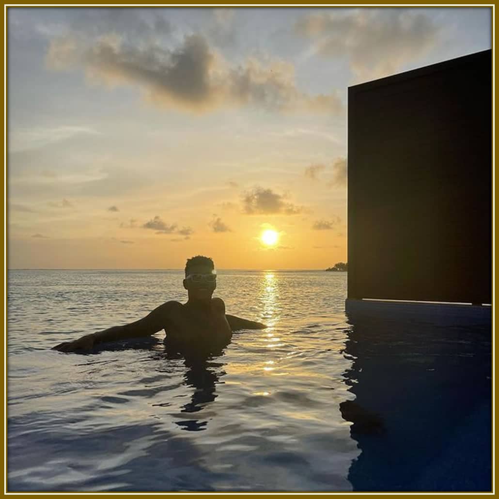 He loves to unwinds especially in this stunning Maldivian sunset, embracing the calm of paradise.