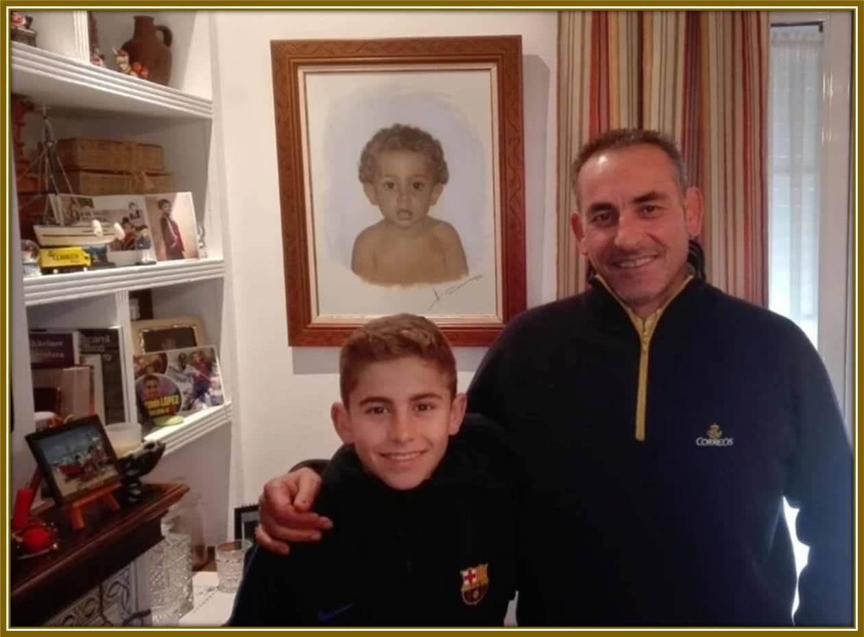 The Father and son moment. Can you spot the painting of the oung prodigy on the wall?