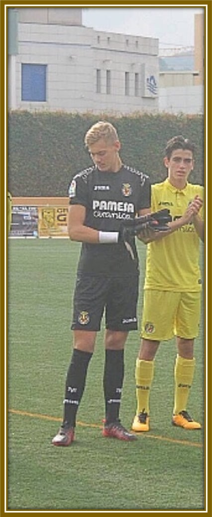 Young Filip Jörgensen proudly lines up in Villarreal colors, marking the start of his journey with the Yellow Submarines.