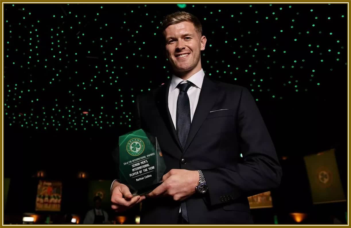 He proudly held his Republic of Ireland Player of the Year award, a testament to his outstanding performances and leadership on the pitch.