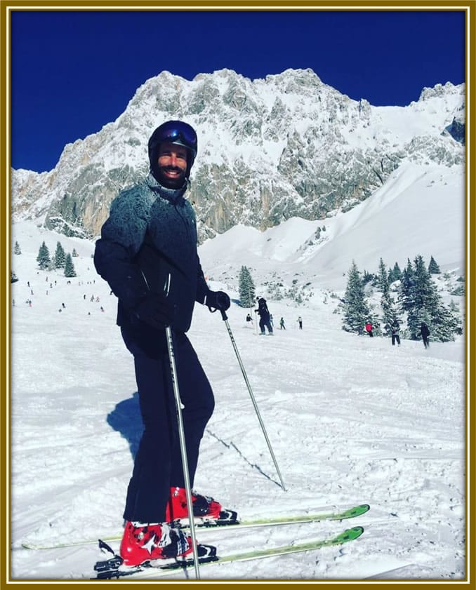 van Nistelrooy enjoying a thrilling moment skiing on ice, showcasing his passion for outdoor adventures beyond football.