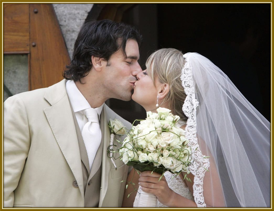 Ruud van Nistelrooy and his wife, Leontien, share a joyful kiss on their wedding day, celebrating their love in front of family, friends, and fans. Image Credit: Helden Media.