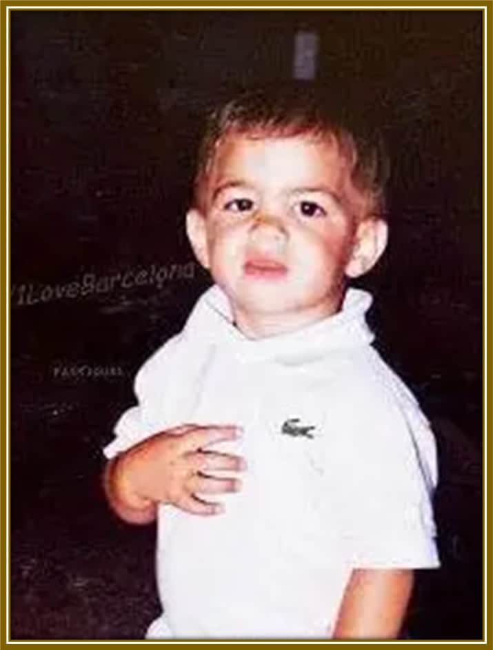 Baby Cesc Fàbregas, already showing off those charming looks that would win hearts on and off the pitch!