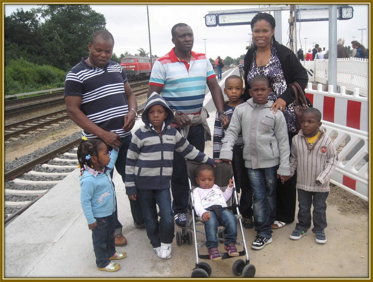 Day Out by the Tracks: The Dorgu Family at the Railway with a Family Friend. Young Patrick is Pictured Here Long Before His Football Fame Took Off