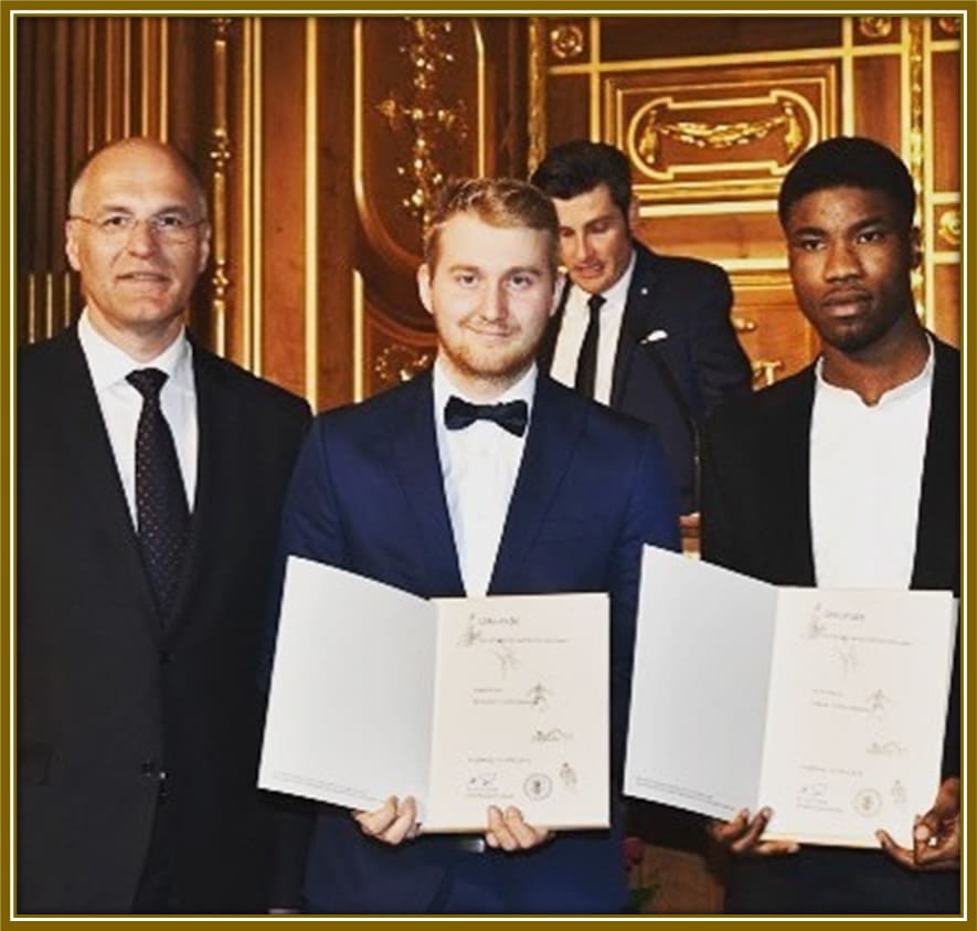 Young and rising! A proud moment for Kevin Danso as he receives the prestigious recognition award from the city of Augsburg, celebrating his meteoric rise in football.