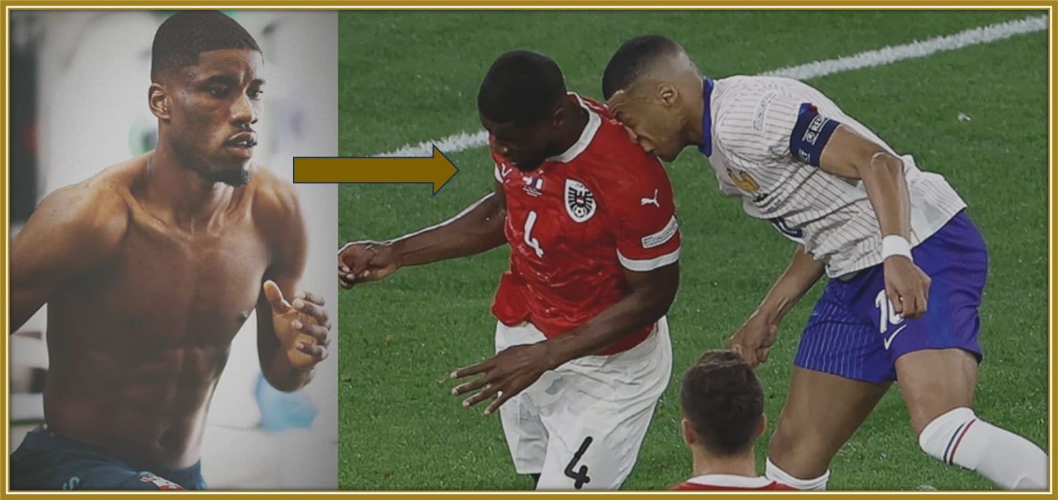 The Moment of Impact That Led to Danso Being Called a Defender with Steel Shoulders: Witness the fierce challenge that left Kylian Mbappé with a broken nose during a high-stakes clash